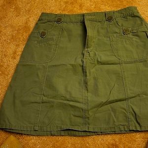 Olive green, mini skirt, pockets with buttons